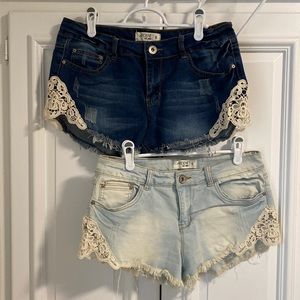 Set of 2 ripped booty shorts, size 9.